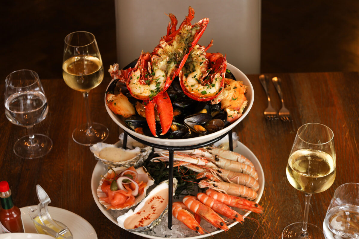 SOLE Seafood & Grill's Seafood Tower featuring lobster, mussels, prawns